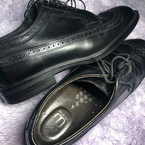 Allen Edmonds wingtip black brogues.  Rubber sole.